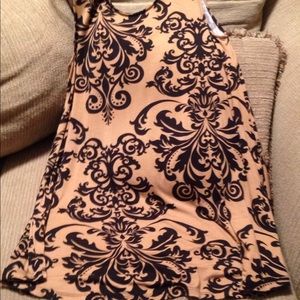 Above knee length dress.